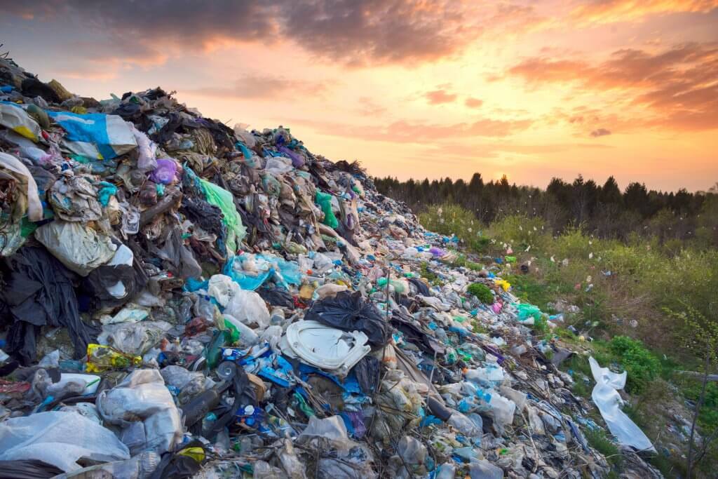 The road among the garbage mountains, which paved buzdozery for removal of the remains of the city. Terrible sight and environmental disaster